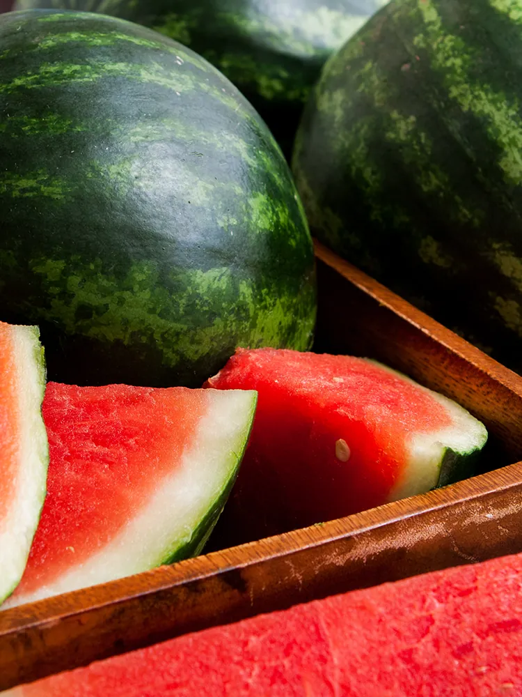 Whole and sliced watermelon