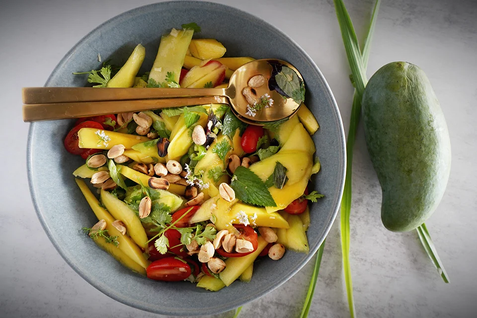 Thai green mango salad with fresh herbs and peanuts