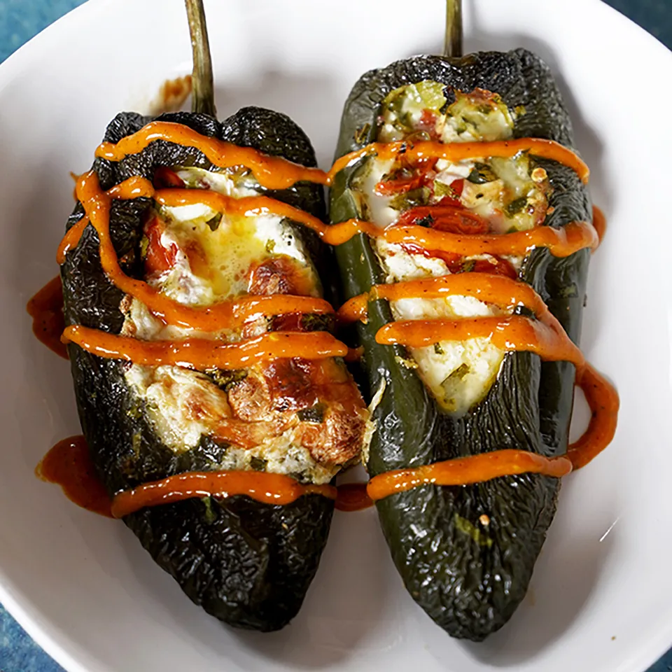 Shrimp, Corn & Zucchini Stuffed Poblanos with Tomatillo Sauce